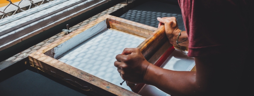 Silk screen printer at work
