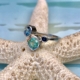 Bethamy Linton, engagement ring, platinum with ethically mined Torrington Emerald, Aquamarine and Sapphire