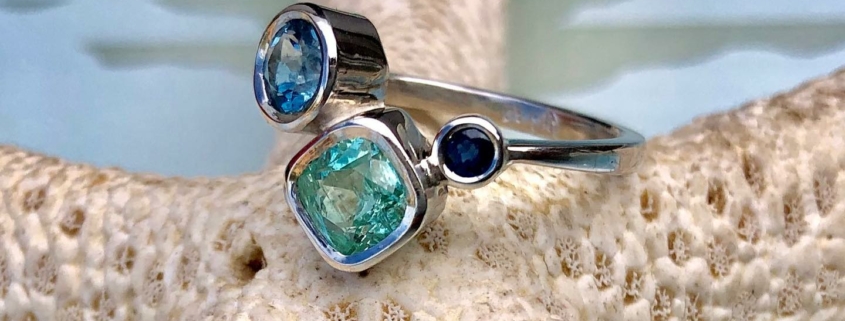 Bethamy Linton, engagement ring, platinum with ethically mined Torrington Emerald, Aquamarine and Sapphire