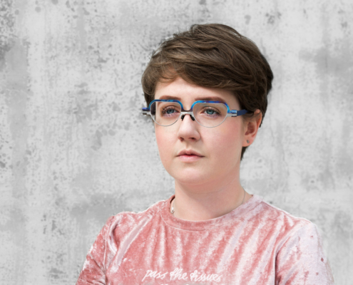 Megan Stewart wears custom designed SMEC Eyeware